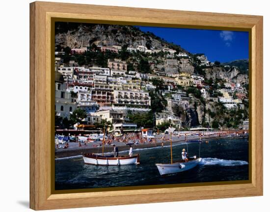 Houses Terraced into Rugged Amalfi Coastline, Boats in Foreground, Positano, Italy-Dallas Stribley-Framed Premier Image Canvas