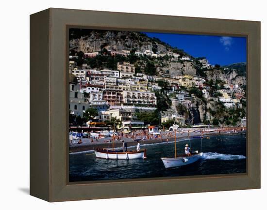 Houses Terraced into Rugged Amalfi Coastline, Boats in Foreground, Positano, Italy-Dallas Stribley-Framed Premier Image Canvas