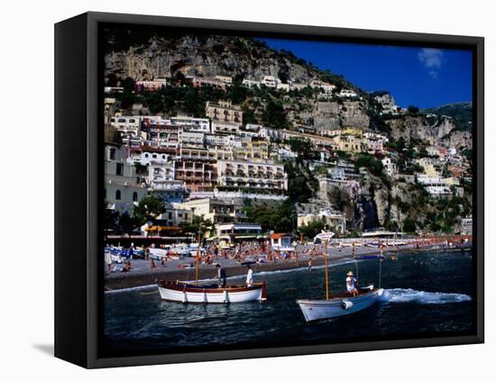 Houses Terraced into Rugged Amalfi Coastline, Boats in Foreground, Positano, Italy-Dallas Stribley-Framed Premier Image Canvas