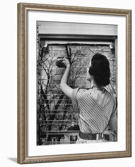 Housewife Cleaning Glass Window Slats-Gordon Parks-Framed Photographic Print