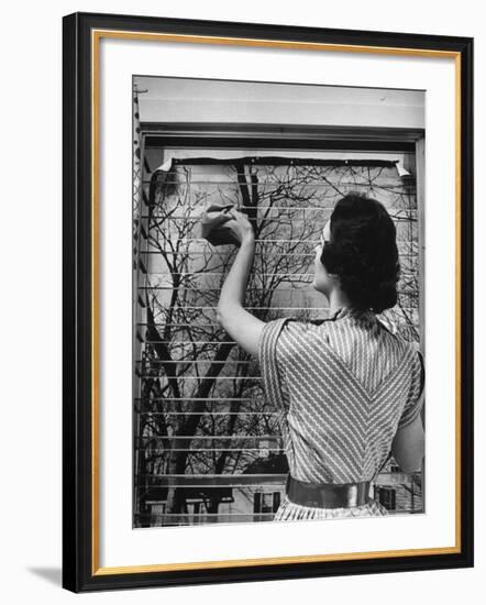 Housewife Cleaning Glass Window Slats-Gordon Parks-Framed Photographic Print