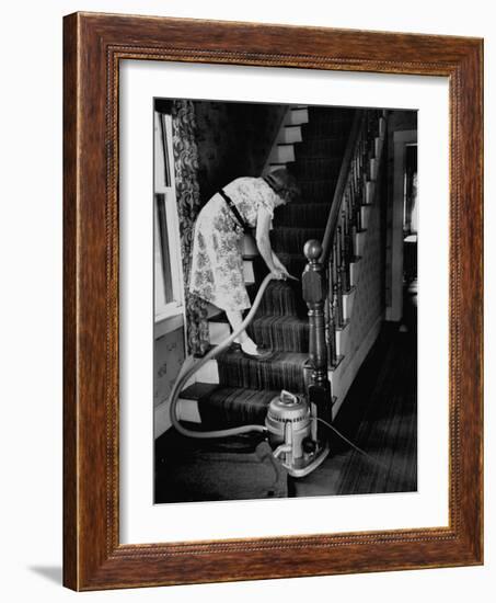 Housewife Cleaning Her Carpet with Vacuum Cleaners-Yale Joel-Framed Photographic Print