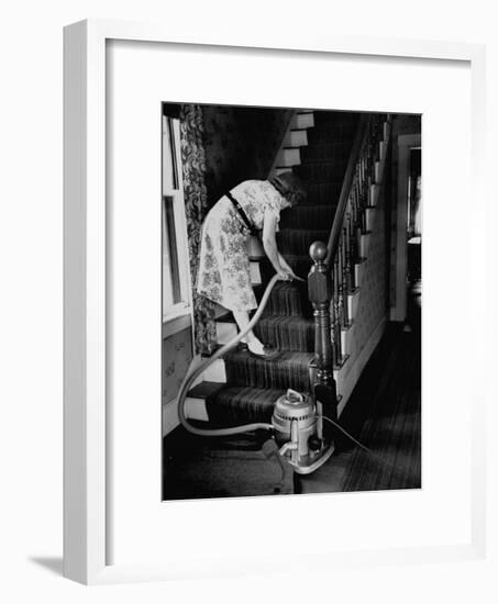 Housewife Cleaning Her Carpet with Vacuum Cleaners-Yale Joel-Framed Photographic Print