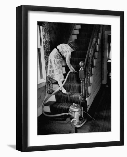 Housewife Cleaning Her Carpet with Vacuum Cleaners-Yale Joel-Framed Photographic Print