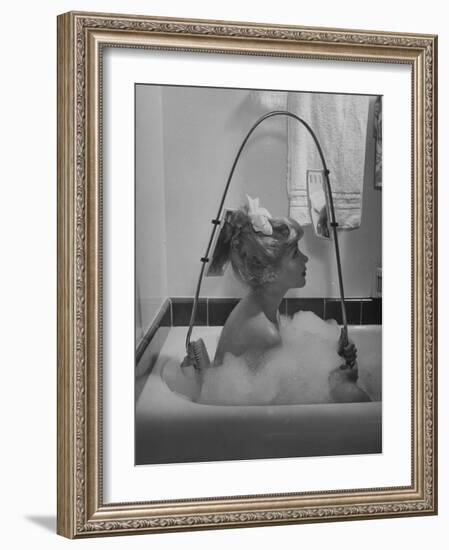 Housewife Using New Innovative Crooked Back Brush Marketed by Los Angeles Brush Manufacture, Inc-Allan Grant-Framed Photographic Print