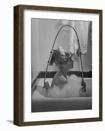 Housewife Using New Innovative Crooked Back Brush Marketed by Los Angeles Brush Manufacture, Inc-Allan Grant-Framed Photographic Print