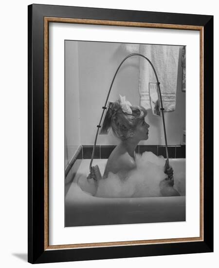 Housewife Using New Innovative Crooked Back Brush Marketed by Los Angeles Brush Manufacture, Inc-Allan Grant-Framed Photographic Print