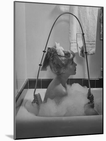 Housewife Using New Innovative Crooked Back Brush Marketed by Los Angeles Brush Manufacture, Inc-Allan Grant-Mounted Photographic Print