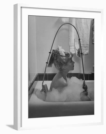 Housewife Using New Innovative Crooked Back Brush Marketed by Los Angeles Brush Manufacture, Inc-Allan Grant-Framed Photographic Print