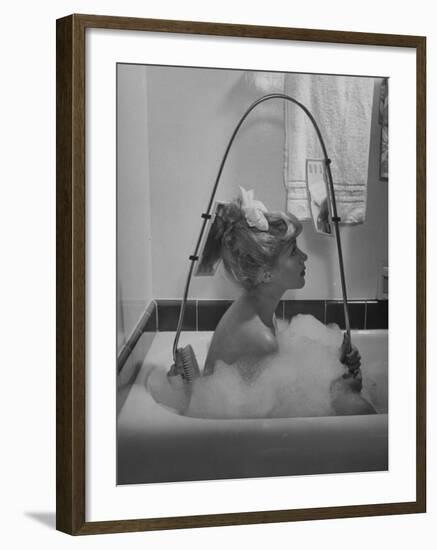 Housewife Using New Innovative Crooked Back Brush Marketed by Los Angeles Brush Manufacture, Inc-Allan Grant-Framed Photographic Print