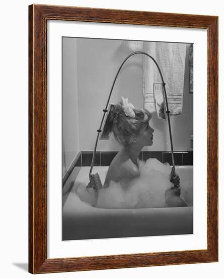 Housewife Using New Innovative Crooked Back Brush Marketed by Los Angeles Brush Manufacture, Inc-Allan Grant-Framed Photographic Print