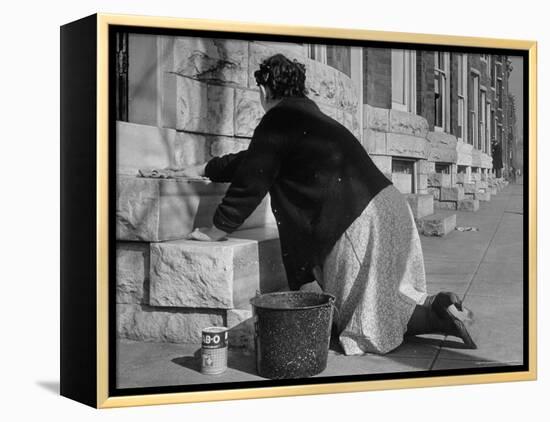 Housewife Washing Her White Stoop During Part of Her Daily Routine-Margaret Bourke-White-Framed Premier Image Canvas