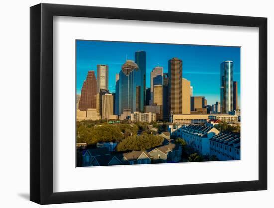HOUSTON, TEXAS - High rise buildings in Houston cityscape illuminated at sunset, Texas, United S...-null-Framed Photographic Print