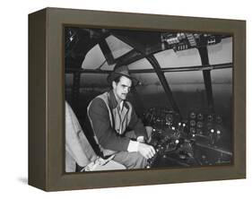 Howard Hughes Sitting at the Controls of His 200 Ton Flying Boat Called the "Spruce Goose"-J. R. Eyerman-Framed Premier Image Canvas