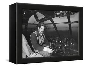 Howard Hughes Sitting at the Controls of His 200 Ton Flying Boat Called the "Spruce Goose"-J. R. Eyerman-Framed Premier Image Canvas