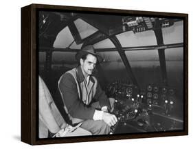 Howard Hughes Sitting at the Controls of His 200 Ton Flying Boat Called the "Spruce Goose"-J. R. Eyerman-Framed Premier Image Canvas