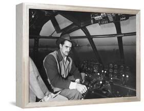 Howard Hughes Sitting at the Controls of His 200 Ton Flying Boat Called the "Spruce Goose"-J. R. Eyerman-Framed Premier Image Canvas