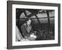 Howard Hughes Sitting at the Controls of His 200 Ton Flying Boat Called the "Spruce Goose"-J. R. Eyerman-Framed Premium Photographic Print