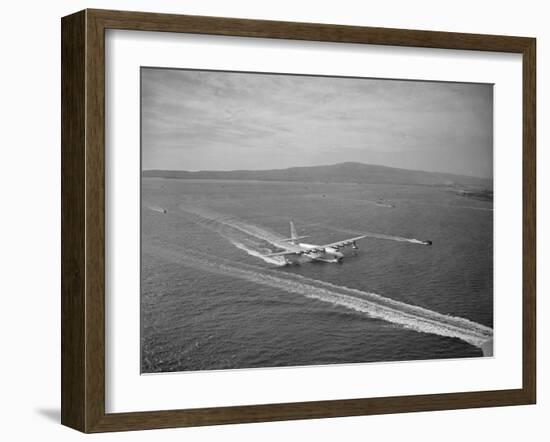 Howard Hughes' Spruce Goose Taxiing across Water-null-Framed Photographic Print