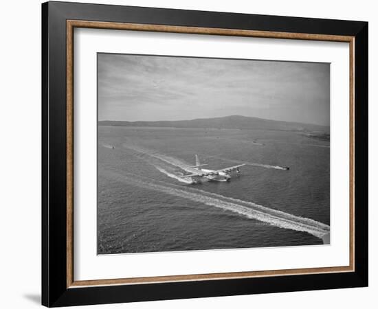 Howard Hughes' Spruce Goose Taxiing across Water-null-Framed Photographic Print