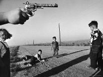 Boy's Hand Holding a Toy Six Shooter Pistol During a Game of "Cops and Robbers"-Howard Sochurek-Photographic Print