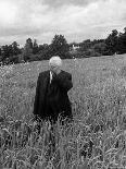 Poet Robert Frost Standing in Oxford Field with His Hand over His Face-Howard Sochurek-Premium Photographic Print