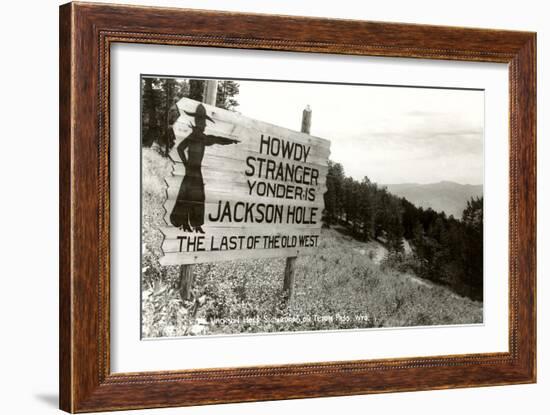 Howdy Stranger, Sign into Jackson Hole, Wyoming-null-Framed Art Print