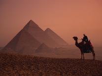 Camel and Rider at Giza Pyramids, UNESCO World Heritage Site, Giza, Cairo, Egypt-Howell Michael-Photographic Print