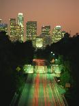 Los Angeles Skyline and Freeway, Illuminated at Night, California, USA-Howell Michael-Photographic Print