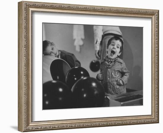 Howie Samuels Jr. and Sister Bobby Listening For the Ball Return at Arrowhead Bowling Alley-George Silk-Framed Photographic Print