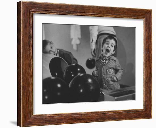 Howie Samuels Jr. and Sister Bobby Listening For the Ball Return at Arrowhead Bowling Alley-George Silk-Framed Photographic Print