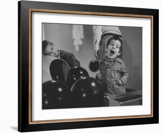 Howie Samuels Jr. and Sister Bobby Listening For the Ball Return at Arrowhead Bowling Alley-George Silk-Framed Photographic Print