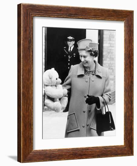 Hrh Queen Elizabeth II with Teddy Bear For Princess Beatrice June 1989-null-Framed Photographic Print