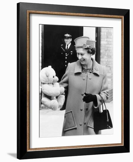 Hrh Queen Elizabeth II with Teddy Bear For Princess Beatrice June 1989-null-Framed Photographic Print