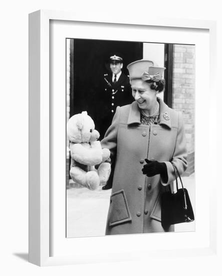 Hrh Queen Elizabeth II with Teddy Bear For Princess Beatrice June 1989-null-Framed Photographic Print