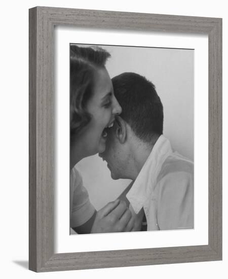 HS Senior Judy Krug Laughs Into Friend's Ear shows Why She Was Considered Most Talkative in School-Gordon Parks-Framed Photographic Print