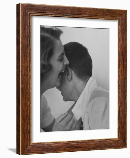 HS Senior Judy Krug Laughs Into Friend's Ear shows Why She Was Considered Most Talkative in School-Gordon Parks-Framed Photographic Print