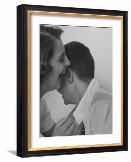 HS Senior Judy Krug Laughs Into Friend's Ear shows Why She Was Considered Most Talkative in School-Gordon Parks-Framed Photographic Print