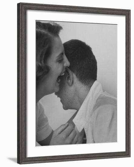 HS Senior Judy Krug Laughs Into Friend's Ear shows Why She Was Considered Most Talkative in School-Gordon Parks-Framed Photographic Print