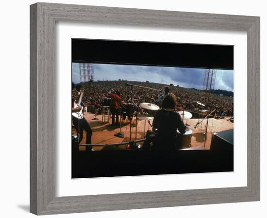 Huge Crowd Listening to a Band Onstage at the Woodstock Music and Art Festival-Bill Eppridge-Framed Photographic Print