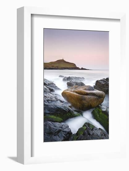 Huge granite boulder lodged on the shores of Porth Ledden at dawn, Cornwall, England. Spring (April-Adam Burton-Framed Photographic Print