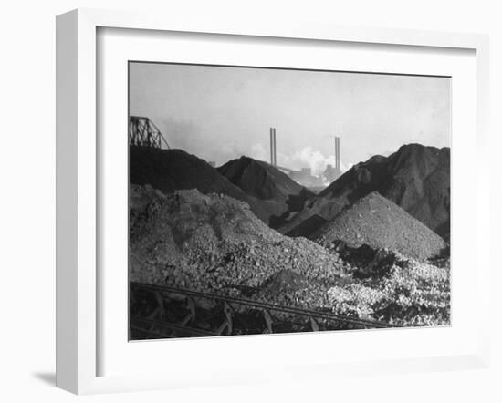 Huge Heaps of Iron Ore Outside Steel Plant, Brought in by Shipping Along the Great Lakes-Margaret Bourke-White-Framed Photographic Print