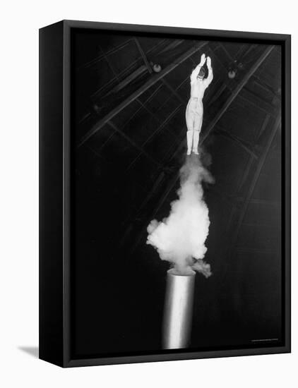 Human Cannonball Egle Zacchini Emerging From Barrel of Cannon During Her Circus Act-Cornell Capa-Framed Premier Image Canvas