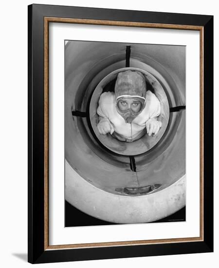 Human Cannonball Egle Zacchini, Inside Cannon Just Before Her Launching During Circus Act-Cornell Capa-Framed Photographic Print