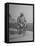 Humorous of Man Riding Tiny Bicycle-Wallace Kirkland-Framed Premier Image Canvas