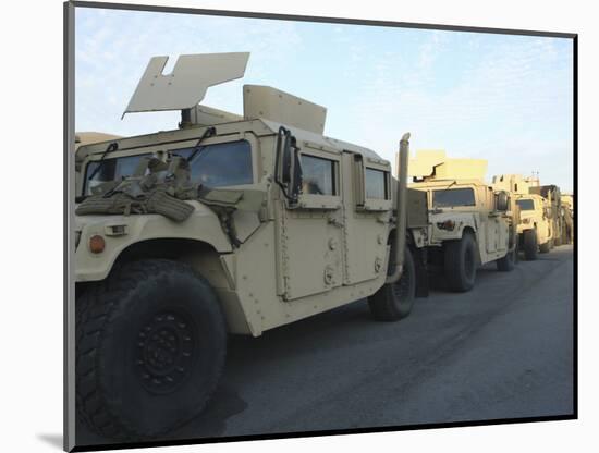 Humvees Sit on the Pier at Morehead City, North Carolina, Awaiting Deployment-null-Mounted Photographic Print