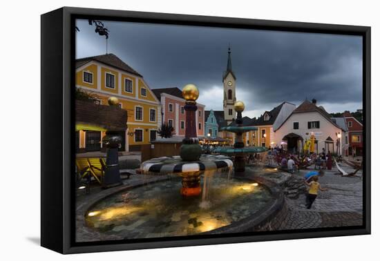 Hundertwasser Well on the Main Square, in the Background the Town Parish Church, Austria-Volker Preusser-Framed Premier Image Canvas