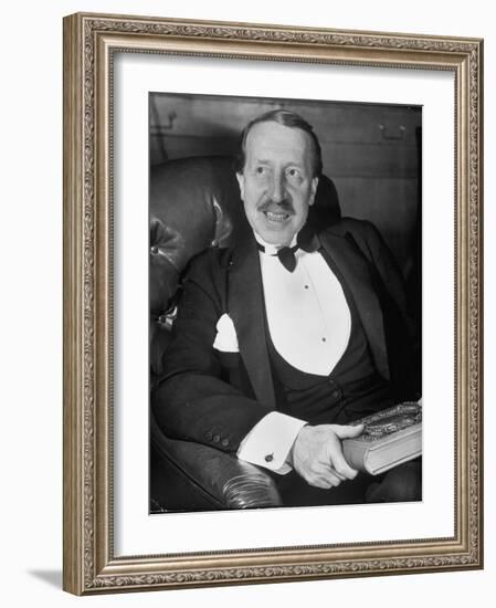 Hungarian Prince George Festetics Clad in Tuxedo While Sitting in Chair at Festetics Castle-Margaret Bourke-White-Framed Photographic Print