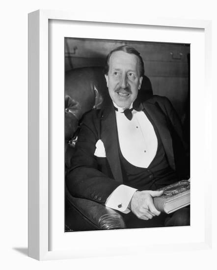 Hungarian Prince George Festetics Clad in Tuxedo While Sitting in Chair at Festetics Castle-Margaret Bourke-White-Framed Photographic Print