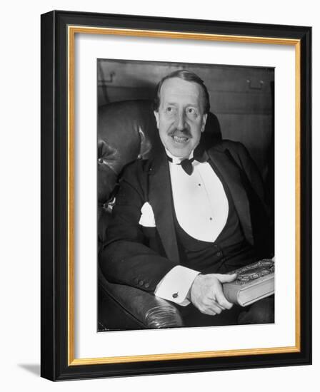 Hungarian Prince George Festetics Clad in Tuxedo While Sitting in Chair at Festetics Castle-Margaret Bourke-White-Framed Photographic Print